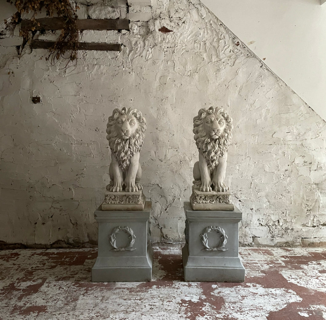 Pair Of 20th Century French Lions On Plinths