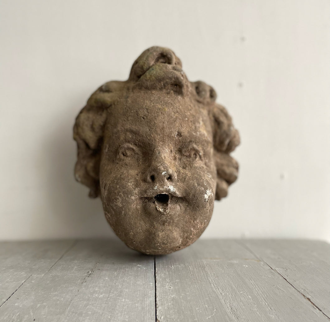 Late 19th Century French Stone Putti Head